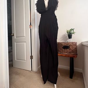 Freepeople. Size 8. Black jumpsuit. Used only once.